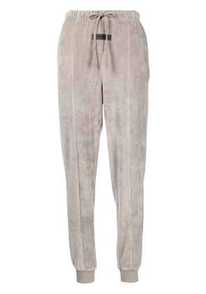 FEAR OF GOD ESSENTIALS tapered velour track pants - Grey