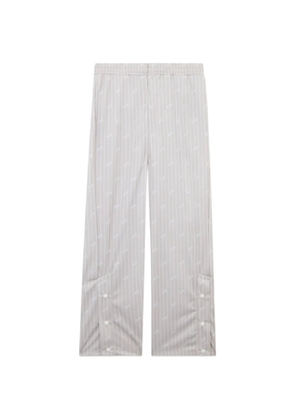 GCDS pinstripe logo-motif track pants - Neutrals