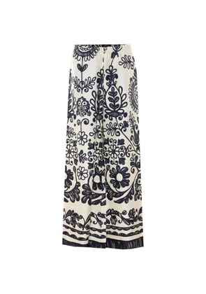 Maurizio Pecoraro floral-print trousers - Blue