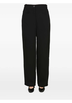 KHAITE high-waisted trousers - Black