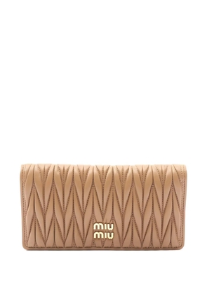 Miu Miu Pre-Owned 2010s Matelasse bi-fold leather wallet - Neutrals