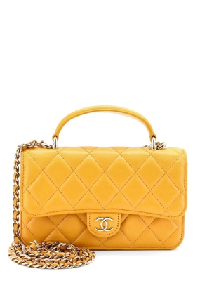 CHANEL Pre-Owned Classic Top Handle Flap Phone Holder with Chain Quilted Lambskin crossbody bag - Yellow