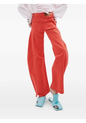 A.W.A.K.E. Mode logo-patch jeans - Red