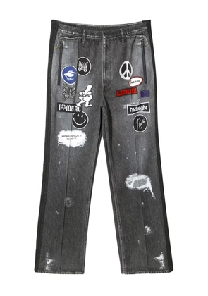 Needles patch-detailing track jeans - Black