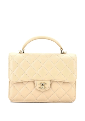 CHANEL Pre-Owned CC Top Handle Quilted Lambskin Small backpack - Neutrals