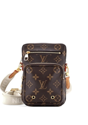Louis Vuitton Pre-Owned Utility Phone Sleeve Bag Monogram Canvas crossbody bag - Brown