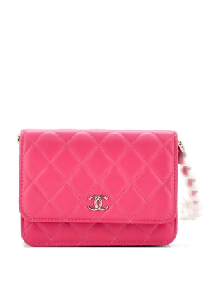 CHANEL Pre-Owned Pearl Strap CC Wallet on Chain Quilted Calfskin Mini crossbody bag - Pink