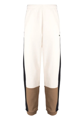Lacoste logo-embroidered colour-block track pants - White