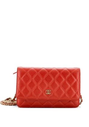 CHANEL Pre-Owned Wallet on Chain Quilted Caviar crossbody bag - Orange