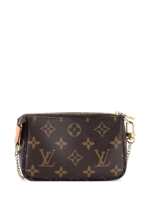 Louis Vuitton Pre-Owned Pochette Accessoires Monogram Canvas Mini clutch bag - Brown