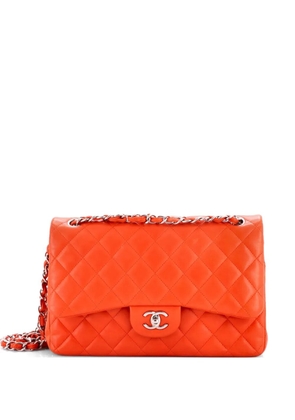 CHANEL Pre-Owned Classic Double Flap Bag Quilted Lambskin Jumbo shoulder bag - Orange