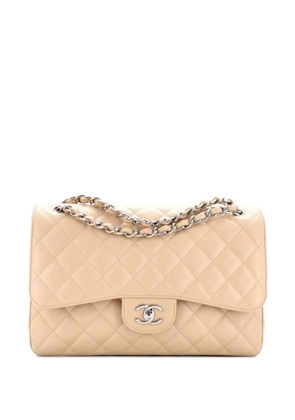 CHANEL Pre-Owned Classic Double Flap Bag Quilted Caviar Jumbo shoulder bag - Neutrals