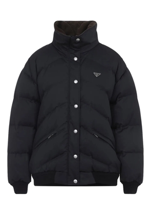 Prada quilted logo-plaque puffer jacket - Black