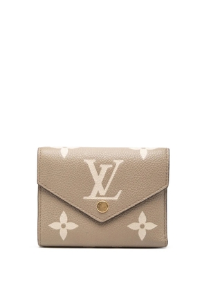 Louis Vuitton Pre-Owned 2020-2025 Bicolor Monogram Empreinte Giant Victorine Wallet small wallets - Neutrals