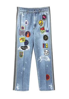 Needles patch-detailing track jeans - Blue