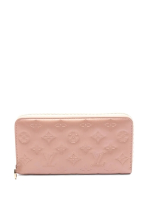 Louis Vuitton Pre-Owned 2010s embossed zip leather wallet - Pink