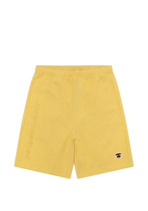 AAPE BY *A BATHING APE® graphic-print shorts - Yellow