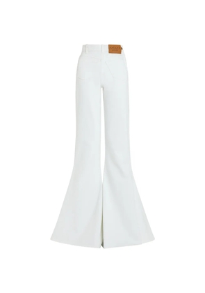 A.W.A.K.E. Mode logo-patch flared jeans - White