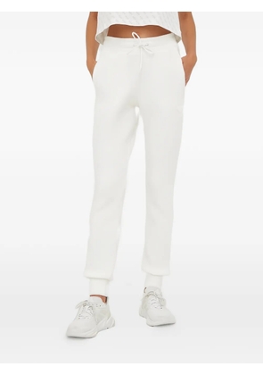 GUESS USA logo-debossed track pants - White