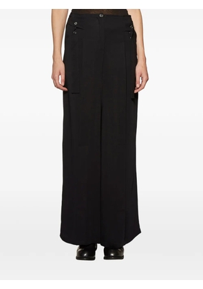 Primordial Is Primitive button-detail trousers - Black