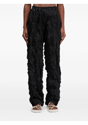 Osklen plissé texture trousers - Black