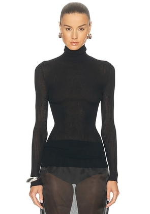 Brandon Maxwell Ribbed Turtleneck Top in Black - Black. Size L (also in M, S, XS).