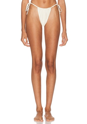 Montce X Elsa Hosk Brasil Side Tie Bikini Bottom in Cream Silkie - Cream. Size L (also in M, S, XS).