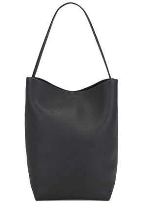 The Row Large N/S Park Tote Bag in Midnight - Navy. Size all.