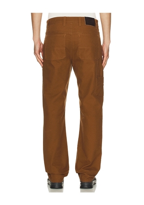 Filson Dry Tin Double Front Pants in Brown. Size 30x34. Also in 32x32, 34x32.
