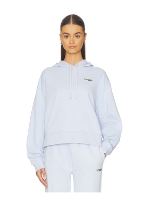 Lacoste Oversize Fit Molleton Hoodie in Baby Blue. Size 36. Also in 38, 40.
