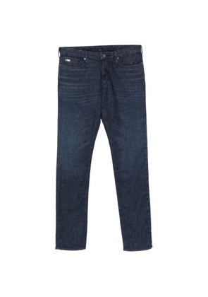 Emporio Armani J06 logo-plaque jeans - Blue