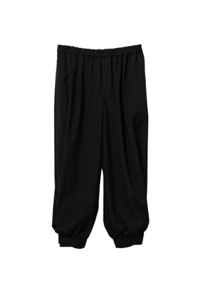 Black Comme Des Garçons wool trousers