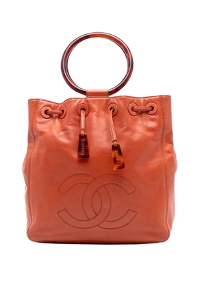 CHANEL Pre-Owned 1997-1999 CC Lambskin Tortoise Ring Drawstring tote bag - Orange