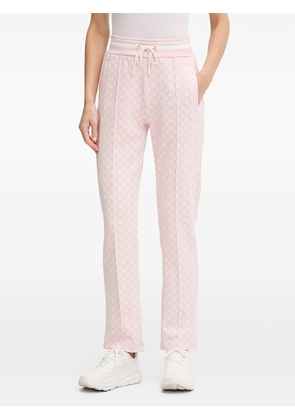 GUESS USA logo-patterned track pants - Pink
