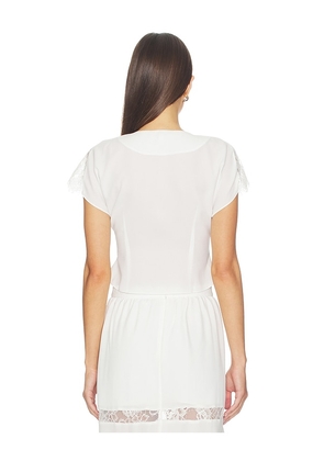 fleur du mal Georgette Flounce Top in Ivory. Size XS. Also in S, M, L.
