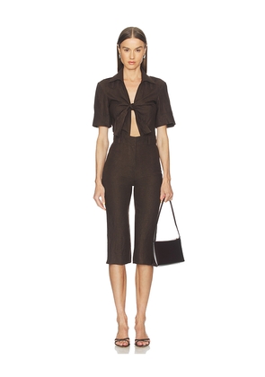 SELMACILEK Polo Jumpsuit in Brown. Size S. Also in XS, M, L.