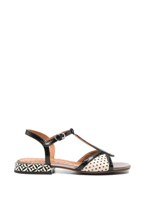 Chie Mihara perforated t-strap sandals - Black