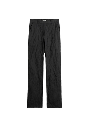 TOTEME crinkled-effect trousers - Black