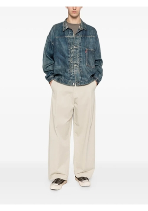 Junya Watanabe MAN faded-effect cinch-strap denim jacket - Blue