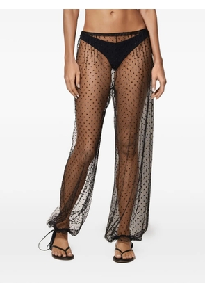 Kiki de Montparnasse Merci polka-dot trousers - Black