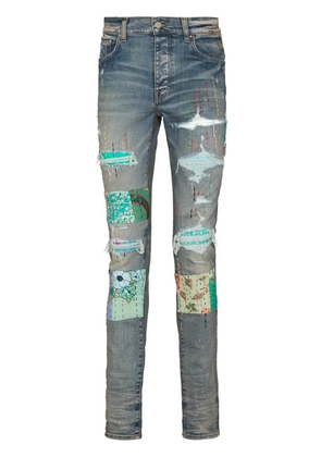 AMIRI quilted patch-detail slim-fit jeans - Blue