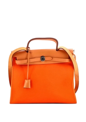 Hermès Pre-Owned Herbag Zip Leather and Toile 31 shoulder bag - Orange