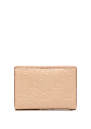 Gucci Pre-Owned 2016-2026 GG Emblem Leather Bifold Wallet small wallets - Neutrals