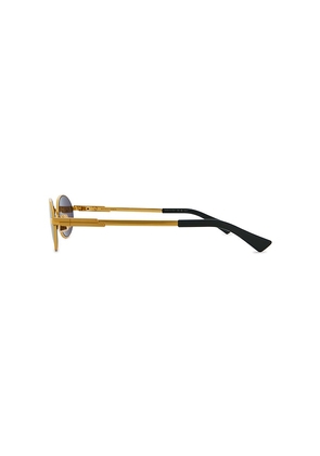 Bottega Veneta Oval Sunglasses in Metallic Gold.
