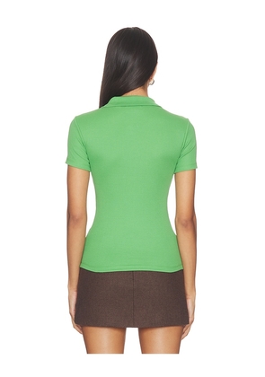 Lacoste Slim Fit Cotes Polo in Green. Size 32. Also in 34, 36, 38, 40, 44.