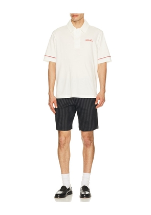 Khalhon Saturday Club Emblem Polo in White. Size L. Also in M, XL/1X, XXL/2X.