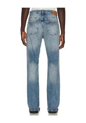 Tommy Jeans Robbie Bootcut Jeans in Blue. Size 30. Also in 32, 33, 34, 36.