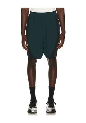 Y-3 Ultralight Woven Shorts in Dark Green. Size L. Also in M, XL/1X.