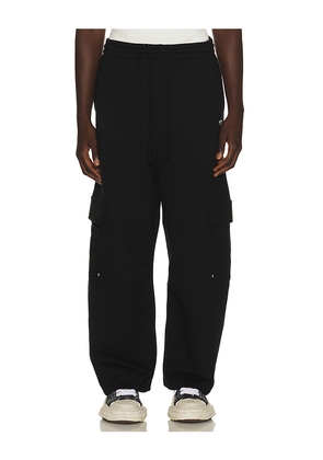 WE11DONE Wide Fit Cargo Pants in Black. Size L. Also in M, S, XL/1X.