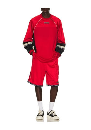 WE11DONE Sporty Football Jersey Shorts in Red,Black. Size L. Also in M, S, XL/1X.